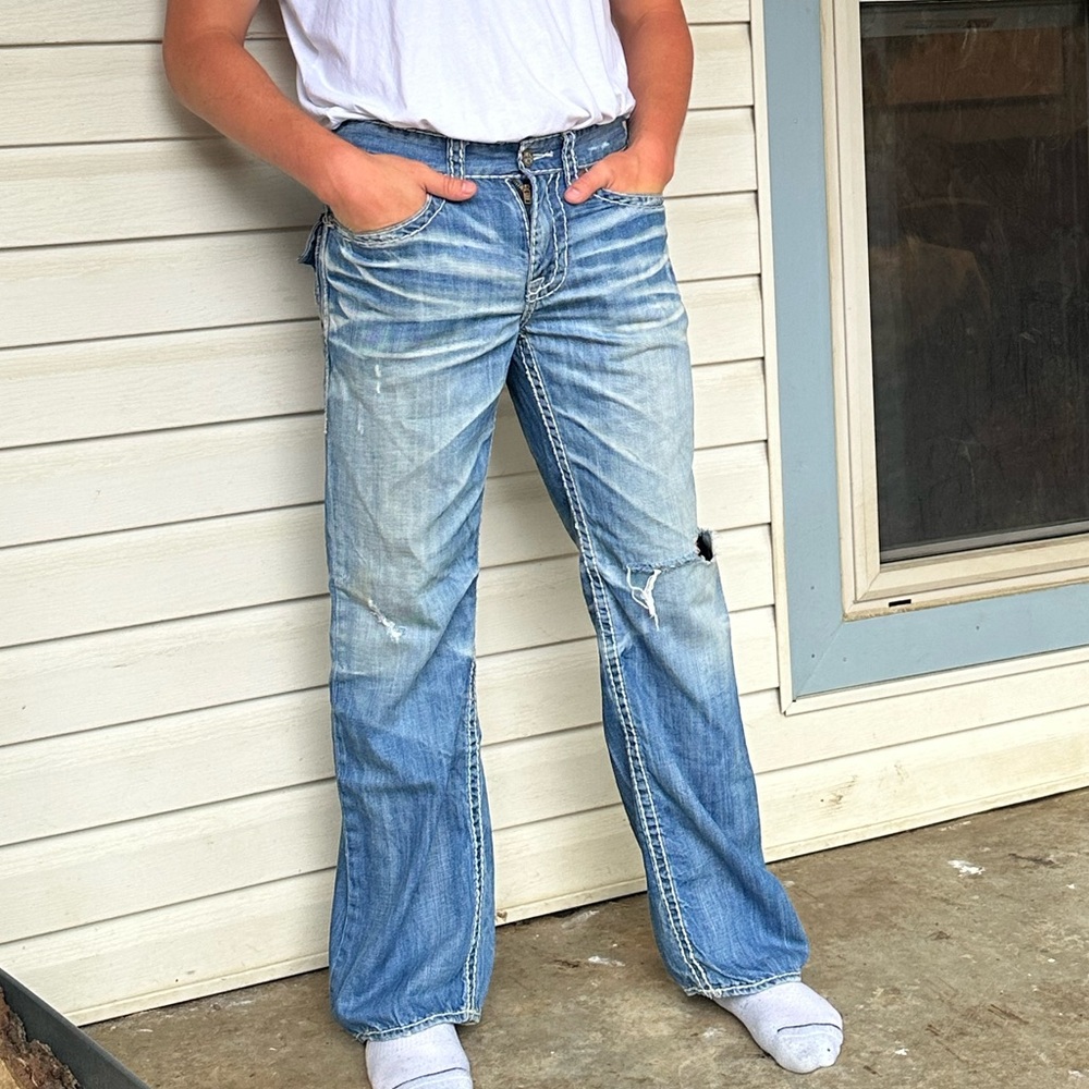 Big star legendary blue jeans faded and ripped